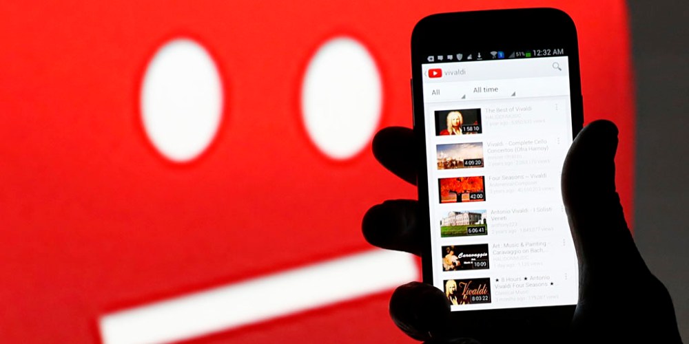 YouTube on a smartphone: the company is accused of playing Goliath to small indie music labels.