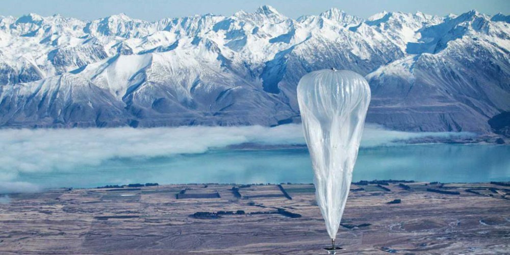 In this June 10, 2013 photo released by Jon Shenk, a Google balloon sails through the air with the Southern Alps mountains in the background, in Tekapo, New Zealand. Google is testing the balloons which sail in the stratosphere and beam the Internet to Earth. (AP Photo/Jon Shenk) EDITORIAL USE ONLY