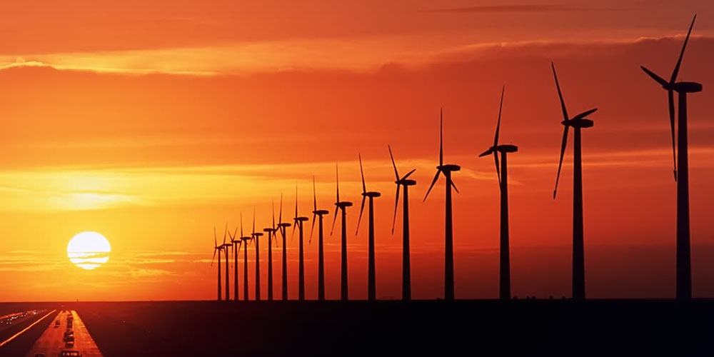 wind-turbine-farm-sunset